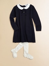 Simply beautiful in a cotton and cashmere blend with a Peter Pan collar, front button detail, sweet bow and scalloped trim.Peter Pan collarLong sleevesBack buttonsScalloped hem and cuffs92% cotton/8% cashmereDry cleanImported Please note: Number of buttons may vary depending on size ordered. 