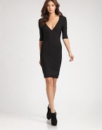 Signature bandage construction, featuring a sexy plunging neckline offset by demure elbow-length sleeves.V necklineElbow-length sleevesBandage constructionBack zipAbout 23 from natural waist90% rayon/9% nylon/1% spandexDry cleanImportedModel shown is 5'11 (180cm) wearing US size Small. 