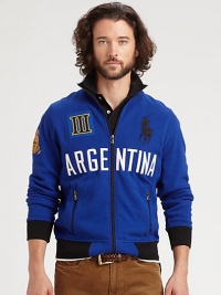 Sport your support of Argentina in a full-zip pieced fleece jacket with bold color-blocking, a snow polo crest and Ralph Lauren's embroidered Big Pony for a signature finish.Zip frontStand collarSide zip pocketsBanded cuffs and hem67% cotton/33% polyesterMachine washImported Sport your support of Argentina in a full-zip pieced fleece jacket with bold color-blocking, a snow polo crest and Ralph Lauren's embroidered Big Pony for a signature finish.Zip frontStand collarSide zip pocketsBanded cuffs and hem67% cotton/33% polyesterMachine washImported