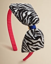 This wildly cute hair accessory features a ziger bow with a heart charm and a hot pink headband. This wildly cute hair accessory features a ziger bow with a heart charm and a hot pink headband.