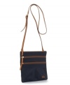 An easy way to add a pop of color to your outfit-throw on the nylon North South crossbody purse from Dooney & Bourke.