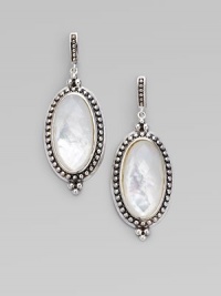 A simply chic design with an oval mother-of-pearl doublet surrounded by a delicate band of dots. Mother-of-pearl doubletsSterling silverEurowire backLength, about ¾Imported A simply chic design with an oval mother-of-pearl doublet surrounded by a delicate band of dots. Mother-of-pearl doubletsSterling silverEurowire backLength, about ¾Imported