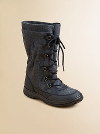 An essential boot is constructed with a fleece-lined wool upper and a durable rubber sole to keep the wind and water away.Lace-upWool upper with leather trimFleece liningRubber solePadded insoleImported An essential boot is constructed with a fleece-lined wool upper and a durable rubber sole to keep the wind and water away.Lace-upWool upper with leather trimFleece liningRubber solePadded insoleImported
