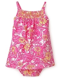 The perfect sunny dress for summer gatherings, this sleeveless bloomer and dress set is replete with bright floral patterns. The perfect sunny dress for summer gatherings, this sleeveless bloomer and dress set is replete with bright floral patterns.