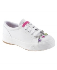 The clean, classic style of these darling Keds shoes kicks it up with fun charm lace keepers. The clean, classic style of these darling Keds shoes kicks it up with fun charm lace keepers.