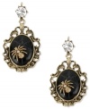 Become a spider(wo)man. Betsey Johnson's vintage-inspired earrings flaunts gold tone spider accents on black oval beads. Crystal accent at post. Crafted in antiqued gold tone mixed metal. Approximate drop: 2-1/4 inches.