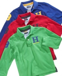 The polo shirt is in play: Tommy Hilfiger updates the classic with a capital H graphic, long sleeves, and a number patch, and winds up with a style that will carry any boy straight through the school year. The polo shirt is in play: Tommy Hilfiger updates the classic with a capital H graphic, long sleeves, and a number patch, and winds up with a style that will carry any boy straight through the school year.
