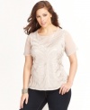 Tonal embroidery creates an appealing texture on INC's lightweight, layerable plus size top. (Clearance)