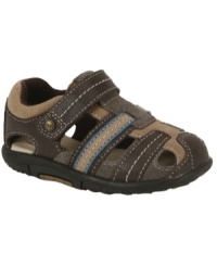 Walk the line. Rounded edges and lining keep him comfortably on his feet in these adorable sandals from Stride Rite. Walk the line. Rounded edges and lining keep him comfortably on his feet in these adorable sandals from Stride Rite.