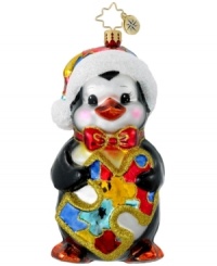 Wish for autism awareness with this charity ornament from Christopher Radko. A cute penguin clutches a colorful puzzle piece – the symbol of autism advocacy organization, Autism Speaks. Wish for autism awareness with this charity ornament from Christopher Radko. A cute penguin clutches a colorful puzzle piece – the symbol of autism advocacy organization, Autism Speaks.