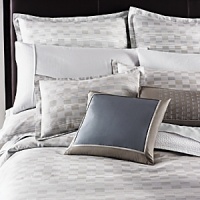 Soften your senses with Illusion, a multi-tonal graphic print with subdued shifting stripes. The shimmering sateen top-of-bed is styled with a subtle-print sheet. Elegant silk and embroidered piqué pillows punctuate the evocative shades of the bed, completing a statement in chic modernity. Soften your senses with Illusion, a multi-tonal graphic print with subdued shifting stripes. The shimmering sateen top-of-bed is styled with a subtle-print sheet. Elegant silk and embroidered piqué pillows punctuate the evocative shades of the bed, completing a statement in chic modernity.