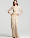 Unique beaded lattice detail lends an air of drama to this evening-perfect gown from Tadashi Shoji.