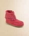 Two tiers of fringe lend a bohemian feel to this not-so-traditional pair of adorable suede high-tops.Side zip closureSuede upperRubber solePadded insoleImported