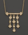 Art-deco inspired 14K yellow gold necklace set with diamonds.