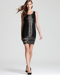 Adrianna Papell's sequin embellished dress lends downtown chic in a simple, sheath silhouette. Adrianna Papell's sequin embellished dress lends downtown chic in a simple, sheath silhouette.