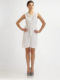 Darling crochet and floral applique lend a feminine touch to this airy cotton shift.Jewel necklineSleevelessButton-down frontDrawstring waistAbout 22 from natural waist60% cotton/40% rayonDry cleanImportedModel shown is 5'10 (177cm) wearing US size Small. Darling crochet and floral applique lend a feminine touch to this airy cotton shift.Jewel necklineSleevelessButton-down frontDrawstring waistAbout 22 from natural waist60% cotton/40% rayonDry cleanImportedModel shown is 5'10 (177cm) wearing US size Small.