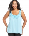 Look pretty in petals with Charter Club's sleeveless plus size top, finished by an appliqued neckline-- layer it with jackets and cardigans this season.