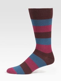 Bold stripes add color and warmth underfoot. Mid-calf height Ribbed cuff 72% cotton/26% nylon/2% spandex Machine wash Imported 