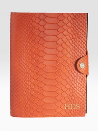 This python-embossed, leather-bound notebook with a snap-tab closure is perfect for everyday note-taking, list-making or journal-writing.LeatherIncludes 176 perforated, lined pagesAbout 5.5 X 7.5Made in USAFOR PERSONALIZATION Select a quantity, then scroll down and click on PERSONALIZE & ADD TO BAG to choose and preview your personalization options. Please allow 1 week for delivery.
