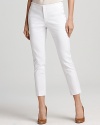 Crisp in white, these Aqua pants boast a high rise that lends itself to a smartly tucked blouse for professional polish.