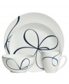 Vera Wang combines her passions for skating and design in the everyday fine Glisse place settings. An indigo-blue ribbon follows the path of a twirling figure skater, sweeping across smooth, snow-white bone china with modern grace.