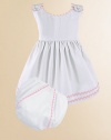 An adorable look for a picnic or a portrait in lightweight cotton piqué with vibrant rick rack trim and a matching diaper cover. Covered button shoulder closures High waist Cotton; machine wash Made in USA Please note: Diaper cover cannot be personalized.FOR PERSONALIZATION Select a quantity, then scroll down and click on PERSONALIZE & ADD TO BAG to choose and preview your personalization options. Please allow 2 to 3 weeks for delivery.