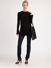 A refreshingly feminine take on the classic tunic, this top features tiers of gorgeous ruffles along cuffs and hem.CrewneckLong sleevesRibbed-knit accentsPull-on styleTiered-ruffle trimAbout 23 from natural waist37% wool/30% viscose/20% polyamide/8% angora/5% cashmereDry cleanMade in Italy of imported fabric Model shown is 5'10½ (179cm) wearing US size Small. A refreshingly feminine take on the classic tunic, this top features tiers of gorgeous ruffles along cuffs and hem.CrewneckLong sleevesRibbed-knit accentsPull-on styleTiered-ruffle trimAbout 23 from natural waist37% wool/30% viscose/20% polyamide/8% angora/5% cashmereDry cleanMade in Italy of imported fabric Model shown is 5'10½ (179cm) wearing US size Small.