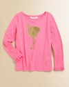 A golden flamingo sparkles the front of this soft knit tee, dressed up with ruffled cuffs.BoatneckLong sleeves with ruffled cuffsCotton/ModalMachine washImported