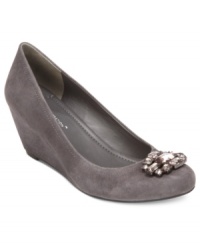 Dress things up a little. BCBGeneration's wedges feature a round closed toe with a sparkly jeweled embellishment up top. Dress things up a little. BCBGeneration's wedges feature a round closed toe with a sparkly jeweled embellishment up top.