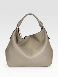 Tote your essentials in this slouchy silhouette crafted of rich pebble-grain leather. Top handle, 5¼ dropAdjustable detachable shoulder strap, 15-15½ dropTop zip closureOne inside zip pocketTwo inside open pocketsCanvas lining16W X 13½H X 5½DImported Tote your essentials in this slouchy silhouette crafted of rich pebble-grain leather. Top handle, 5¼ dropAdjustable detachable shoulder strap, 15-15½ dropTop zip closureOne inside zip pocketTwo inside open pocketsCanvas lining16W X 13½H X 5½DImported