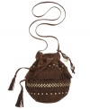 Round off your look with this cool crossbody from Roxy that lends a haute hipster style to everyday outfitting. Flirty fringe and edgy stud accents add instant appeal, while the pocket-lined interior keeps your girl-on-the-go goods safe and secure.