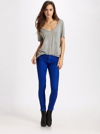 Body-skimming stretch denim reverses to a contrast shade for versatile looks.Mid-rise waistZip-flyFaux front pocketsRise, about 8Inseam, about 3095% cotton/2% elasterell/3% spandexMachine washMade in USA of imported fabric Body-skimming stretch denim reverses to a contrast shade for versatile looks.Mid-rise waistZip-flyFaux front pocketsRise, about 8Inseam, about 3095% cotton/2% elasterell/3% spandexMachine washMade in USA of imported fabric