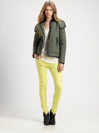 Timeless quilted jacket with a detachable hood and asymmetrical pockets, outlined by contrasting leather trim. Buttoned notch collarRemovable hoodSnap closuresFront zipperLong sleevesAsymmetrical buttoned pocketsAbout 25 from shoulder to hemFully linedBody: Nylon/cottonTrim: LeatherDry clean with leather specialistMade in USA of imported fabricModel shown is 5'10 (177cm) wearing US size Small. Timeless quilted jacket with a detachable hood and asymmetrical pockets, outlined by contrasting leather trim. Buttoned notch collarRemovable hoodSnap closuresFront zipperLong sleevesAsymmetrical buttoned pocketsAbout 25 from shoulder to hemFully linedBody: Nylon/cottonTrim: LeatherDry clean with leather specialistMade in USA of imported fabricModel shown is 5'10 (177cm) wearing US size Small.