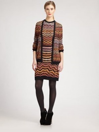 This kinetic, colorfully patterned knit style adds a graphically appealing touch to any ensemble.V necklineLong sleevesButton frontRib-knit cuffs and hemlineAbout 22 from shoulder to hem65% wool/35% nylonDry cleanMade in Italy of imported fabricModel shown is 5'9½ (176cm) wearing US size 4. This kinetic, colorfully patterned knit style adds a graphically appealing touch to any ensemble.V necklineLong sleevesButton frontRib-knit cuffs and hemlineAbout 22 from shoulder to hem65% wool/35% nylonDry cleanMade in Italy of imported fabricModel shown is 5'9½ (176cm) wearing US size 4.