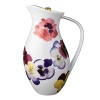 Pensees hot beverage server by Bernardaud. This lively, luxurious collection is sure to transform your table into a celebration of spring. The floral watercolor pattern features delicate, multicolored pansies that appear to be strewn across the surface of each piece.