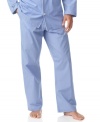 A preppy plaid pattern adorns this essential pajama pant, rendered in smooth woven cotton for a light, comfortable fit