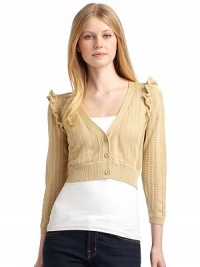 THE LOOKOpen weave designV-neckFront button closureThree-quarter length ribbed cuff sleevesRuffled shouldersRibbed hemTHE FITAbout 15 from shoulder to hemTHE MATERIALCottonCARE & ORIGINDry cleanImportedModel shown is 5'9½ (176cm) wearing US size Small. THE LOOKOpen weave designV-neckFront button closureThree-quarter length ribbed cuff sleevesRuffled shouldersRibbed hemTHE FITAbout 15 from shoulder to hemTHE MATERIALCottonCARE & ORIGINDry cleanImportedModel shown is 5'9½ (176cm) wearing US size Small.