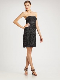 A sophisticated strapless dress with intricate beading and embroidery.Strapless neckline Allover beading and embroidery Empire waist Center rear vent About 21 from natural waist Back zip closure Fully lined Polyester; spot clean Imported Additional Information Women's Premier Designer & Contemporary Size Guide A sophisticated strapless dress with intricate beading and embroidery.Strapless neckline Allover beading and embroidery Empire waist Center rear vent About 21 from natural waist Back zip closure Fully lined Polyester; spot clean Imported Additional Information Women's Premier Designer & Contemporary Size Guide