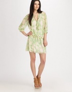 Brightly-printed chiffon in an airy blouson shift styled with a dropped waist and crisp pleats from shoulder to hem.Scarf necklineDropped shouldersGathered sleevesBlouson bodiceDrawstring waistAbout 17 from natural waistSilkDry cleanImportedModel shown is 5'9½ (176cm) wearing US size 4.OUR FIT MODEL RECOMMENDS ordering true size. 