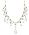 Lovely and ladylike. Carolee's stunning adjustable choker necklace conveys effortless elegance. Crafted in silver tone mixed metal, it's embellished with imitation pearls and glittering glass accents. Approximate length: 12-1/2 inches + 3-inch extender.