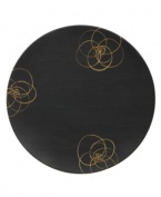 A modern canvas for everyday meals, the Bloom Shadow round platter has a smooth, flat surface that's artfully scribbled with sun-yellow florals for a look that's fresh – and in durable porcelain – not fussy. From Villeroy & Boch.