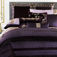 Rendered in shades of deep purple and lilac, Imperial captures the dynastic luxuries and traditions of Beijing's Forbidden City. Imperial coverlet features luxurious silk quilting with velvet borders. Beautiful 400-thread count Natoricotton™ sheets with printed butterflies and an embroidered cotton/silk cuff on the hem of flat sheets and pillowcases. Rendered in shades of deep purple and lilac, Imperial captures the dynastic luxuries and traditions of Beijing's Forbidden City. Imperial coverlet features luxurious silk quilting with velvet borders. Beautiful 400-thread count Natoricotton™ sheets with printed butterflies and an embroidered cotton/silk cuff on the hem of flat sheets and pillowcases.