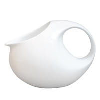 With an array of soft organic curves that recall ripples across the surface of water, Bernardaud's Bulle collection artfully expands the possibilities for an all-white table. With an array of soft organic curves that recall ripples across the surface of water, Bernardaud's Bulle collection artfully expands the possibilities for an all-white table.