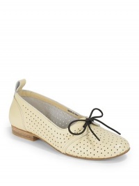 THE LOOKRound toePerforated leather upperLace-up detailLogo-embossed back tabStacked heel, ½ (15mm)THE MATERIALNatural grain leather upperLeather lining and soleORIGINHand-made in SwedenOUR FIT MODEL RECOMMENDS ordering true whole size; ½ sizes should order the next whole size up. THE LOOKRound toePerforated leather upperLace-up detailLogo-embossed back tabStacked heel, ½ (15mm)THE MATERIALNatural grain leather upperLeather lining and soleORIGINHand-made in SwedenOUR FIT MODEL RECOMMENDS ordering true whole size; ½ sizes should order the next whole size up.