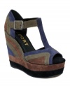 Indulge in the retro stylings of the Zani platform wedge sandals by Report and watch your whole look transform.