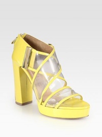 Vibrant patent leather trim radiates from translucent straps, concluding with a stacked heel and convenient back zipper. Stacked heel, 4 (100mm)Stacked platform, ½ (15mm)Compares to a 3½ heel (90mm)Leather upperBack zipperLeather lining and solePadded insoleMade in Italy Vibrant patent leather trim radiates from translucent straps, concluding with a stacked heel and convenient back zipper. Stacked heel, 4 (100mm)Stacked platform, ½ (15mm)Compares to a 3½ heel (90mm)Leather upperBack zipperLeather lining and solePadded insoleMade in Italy