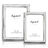 Photo frames by Argento feature unique and authentic tarnish free sterling silver. Hand made and uniquely crafted in Italy. Photo frames by Argento feature unique and authentic tarnish free sterling silver. Hand made and uniquely crafted in Italy.