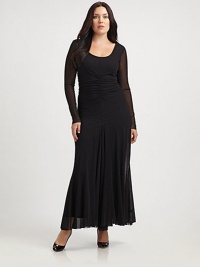 An ethereal, floor-skimming creation featuring front ruching and an elongated silhouette to flatter your body. Sheer sleeves provide clever arm coverage.ScoopneckSheer sleevesRuched centerFully linedAbout 45 from natural waistPolyamideDry cleanMade in Italy An ethereal, floor-skimming creation featuring front ruching and an elongated silhouette to flatter your body. Sheer sleeves provide clever arm coverage.ScoopneckSheer sleevesRuched centerFully linedAbout 45 from natural waistPolyamideDry cleanMade in Italy