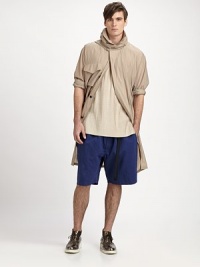This lightweight wonder in pure silk offers lots of options of form and function, with its removable hood and convertible length.Zip-off hood with extended snap tabZip-up convertible collarHidden front zip under placketChest flap, side welt pocketsDrawstring waistRemovable side/back extender panelFully linedAbout 41½ from shoulder to hemSilkDry cleanImported This lightweight wonder in pure silk offers lots of options of form and function, with its removable hood and convertible length.Zip-off hood with extended snap tabZip-up convertible collarHidden front zip under placketChest flap, side welt pocketsDrawstring waistRemovable side/back extender panelFully linedAbout 41½ from shoulder to hemSilkDry cleanImported