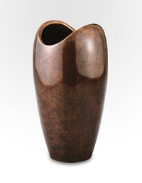 The rounded shape of this handcrafted vase has classic appeal whether you're given to a single bud, a well-edited bouquet or a wild bunch of flowers. And its bronze-finish alloy is a refreshing change from more traditional glass silhouettes. From the Heritage Pebble CollectionAntique copper-plated alloy10H X 5¼ diam.Wipe cleanImported